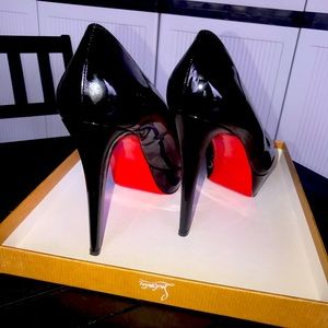 Christian Louboutin Red Bottom platform heels.